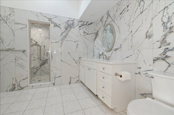 Bathroom, Dual Sink Vanities, Glass Shower, Interior, Marble Walls