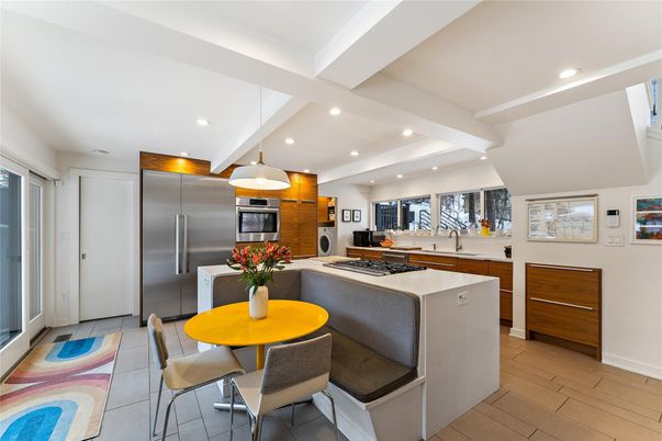 Dining room, Interior, Kitchen, Pendant Lights, Recessed Lighting, Stainless Steel Appliances, Wood Texture Flooring