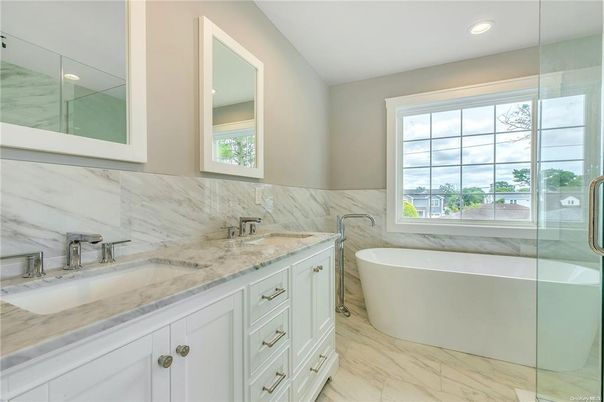 Bathroom, Dual Sink Vanities, Free Standing Baths, Glass Shower, Interior, Marble, Marble Walls, Recessed Lighting