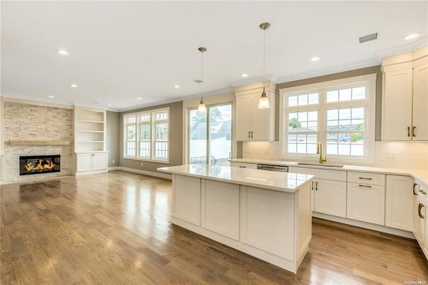 Fireplace, Interior, Kitchen, Pendant Lights, Recessed Lighting, Stone Walls, Wood Texture Flooring