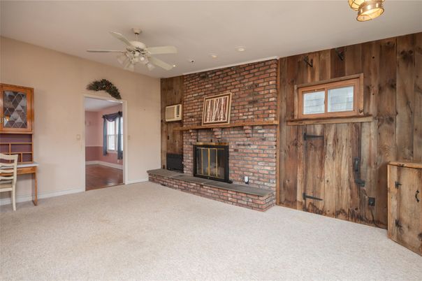 Empty room, Fireplace, Interior, Recessed Lighting, Stone Walls, Wood Texture Flooring, Wooden Walls