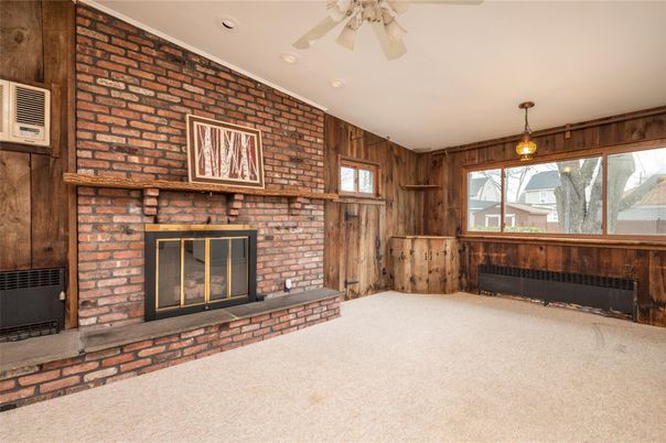 Empty room, Fireplace, Interior, Pendant Lights, Recessed Lighting, Stone Walls, Wooden Walls
