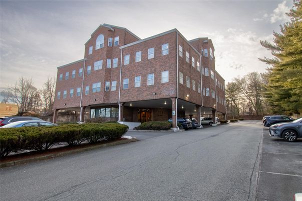 Exterior, Facade, Brick Facade, Condo Building