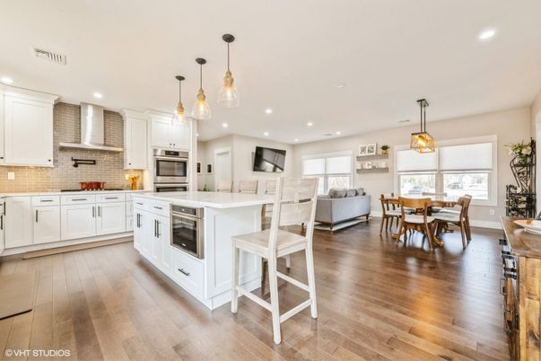 Dining room, Interior, Kitchen, Living room, Pendant Lights, Recessed Lighting, Stainless Steel Appliances, Wood Texture Flooring