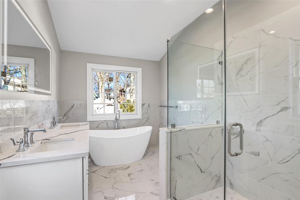 Bathroom, Dual Sink Vanities, Free Standing Baths, Glass Shower, Interior, Marble, Marble Walls, Recessed Lighting