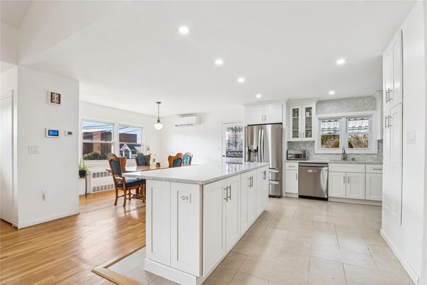 Dining room, Interior, Kitchen, Pendant Lights, Recessed Lighting, Stainless Steel Appliances, Wood Texture Flooring