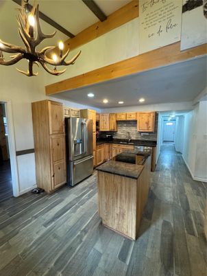 Chandelier, Interior, Kitchen, Recessed Lighting, Stainless Steel Appliances, Wooden Beams, Wood Texture Flooring