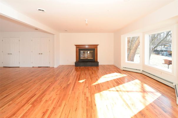 Empty room, Fireplace, Interior, Recessed Lighting, Wood Texture Flooring