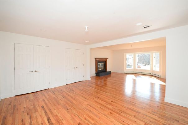 Empty room, Fireplace, Interior, Recessed Lighting, Wood Texture Flooring
