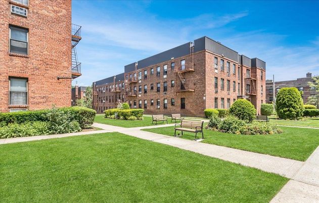 Backyard, Exterior, Facade, Brick Facade, Condo Building