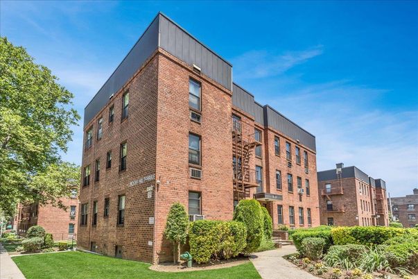 Exterior, Facade, Brick Facade, Condo Building