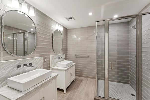 Bathroom, Dual Sink Vanities, Glass Shower, Interior, Recessed Lighting, Wood Texture Flooring