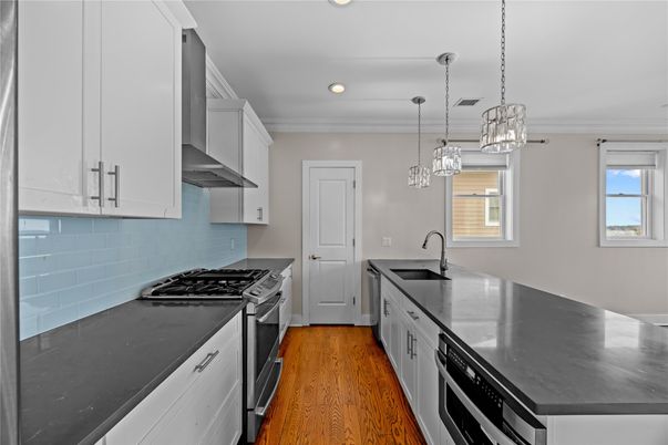 Interior, Kitchen, Pendant Lights, Recessed Lighting, Stainless Steel Appliances, Wood Texture Flooring