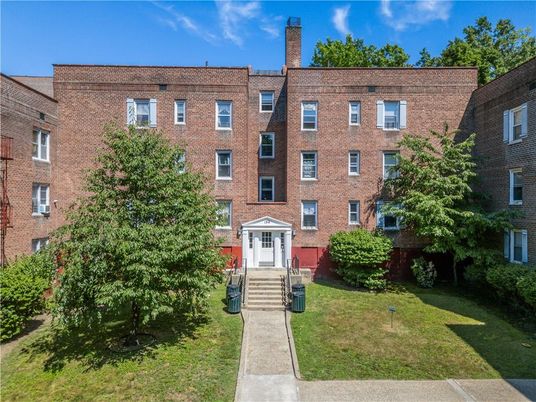 Exterior, Facade, Brick Facade, Condo Building