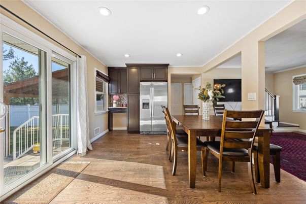 Dining room, Interior, Kitchen, Recessed Lighting, Stainless Steel Appliances, Wood Texture Flooring