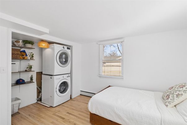 Bedroom, Interior, Utility Closets, Washer, Wood Texture Flooring
