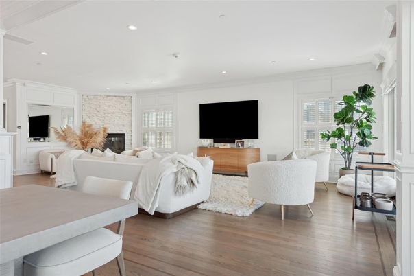 Fireplace, Interior, Living room, Recessed Lighting, Stone Walls, Wood Texture Flooring