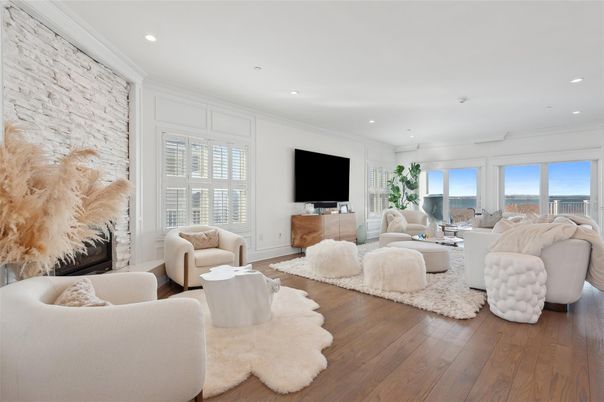 Interior, Living room, Recessed Lighting, Stone Walls, Water, Wood Texture Flooring