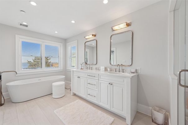 Bathroom, Dual Sink Vanities, Free Standing Baths, Interior, Recessed Lighting, Wood Texture Flooring