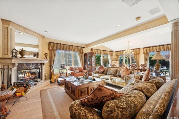 Chandelier, Dining room, Fireplace, Interior, Living room, Recessed Lighting, Wood Texture Flooring