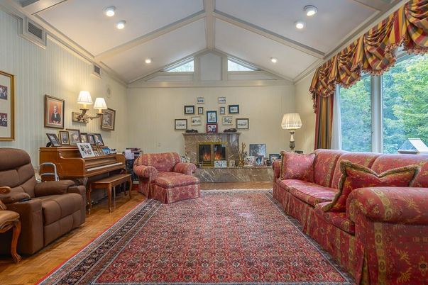 Fireplace, Interior, Living room, Piano, Recessed Lighting, Wood Texture Flooring
