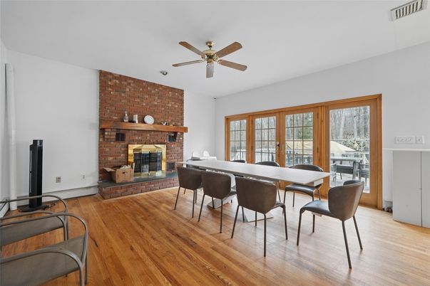 Dining room, Fireplace, Interior, Stone Walls, Wood Texture Flooring