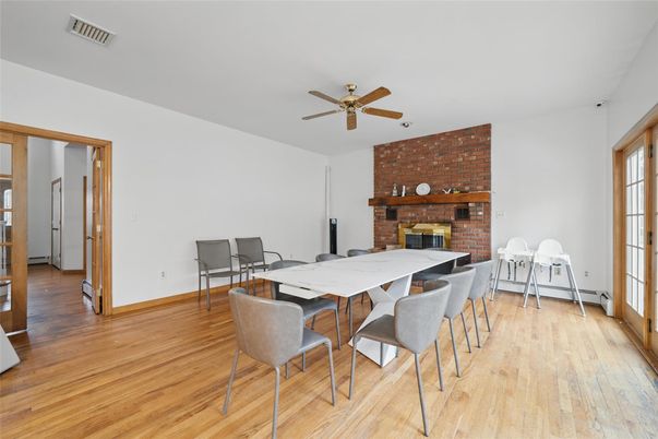 Dining room, Fireplace, Interior, Stone Walls, Wood Texture Flooring