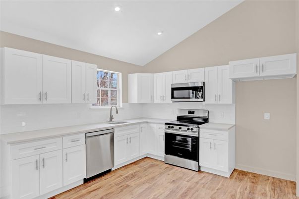 Interior, Kitchen, Recessed Lighting, Stainless Steel Appliances, Wood Texture Flooring