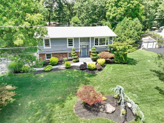 Exterior, Facade, Brick Facade, Raised Ranch