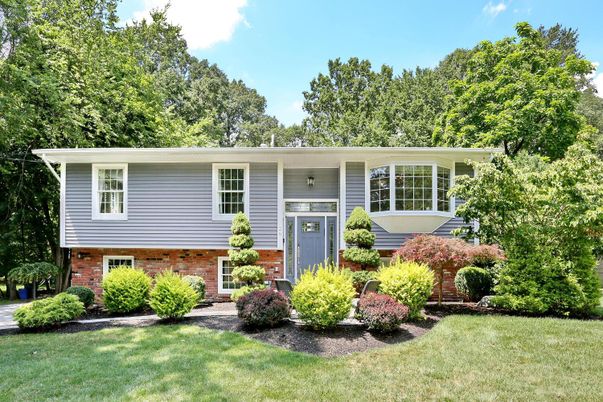 Exterior, Facade, Brick Facade, Raised Ranch