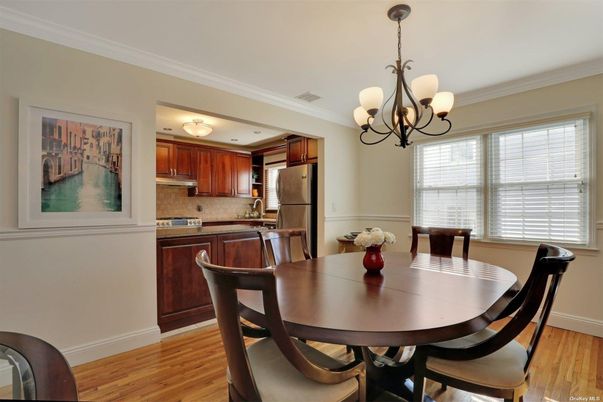 Chandelier, Dining room, Interior, Kitchen, Stainless Steel Appliances, Wood Texture Flooring