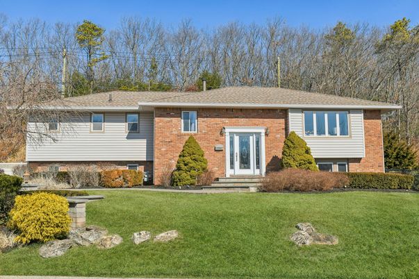 Exterior, Facade, Brick Facade, Raised Ranch