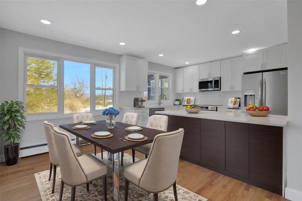Dining room, Interior, Kitchen, Recessed Lighting, Stainless Steel Appliances, Wood Texture Flooring
