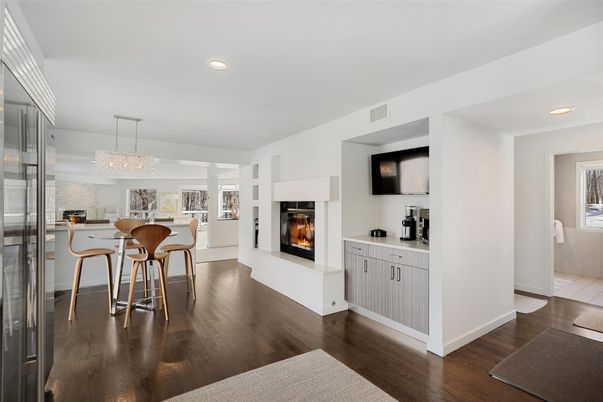 Chandelier, Dining room, Fireplace, Interior, Kitchen, Recessed Lighting, Wood Texture Flooring