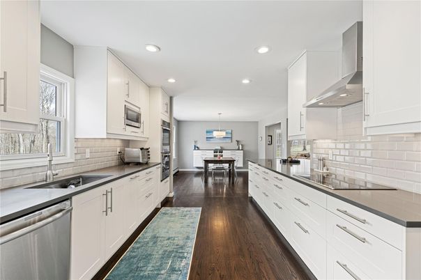 Dining room, Interior, Kitchen, Pendant Lights, Recessed Lighting, Stainless Steel Appliances, Wood Texture Flooring