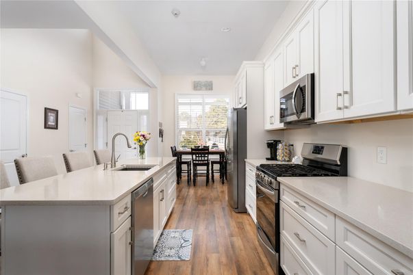 Dining room, Interior, Kitchen, Recessed Lighting, Stainless Steel Appliances, Wood Texture Flooring