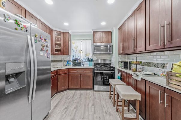 Interior, Kitchen, Recessed Lighting, Stainless Steel Appliances, Wood Texture Flooring