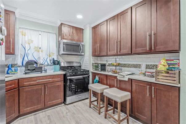 Interior, Kitchen, Recessed Lighting, Stainless Steel Appliances, Wood Texture Flooring
