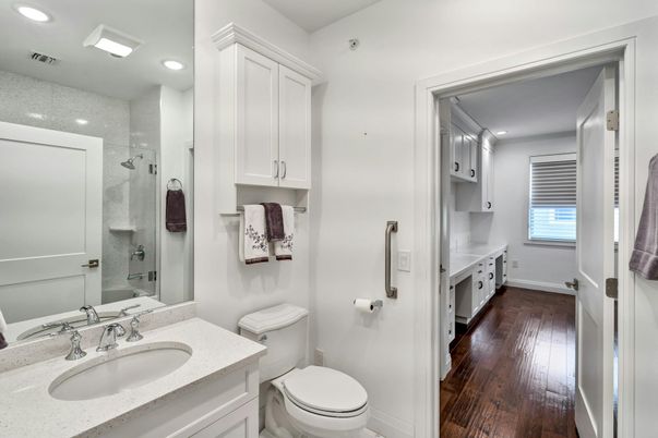 Bathroom, Dual Sink Vanities, Glass Shower, Interior, Recessed Lighting, Wood Texture Flooring