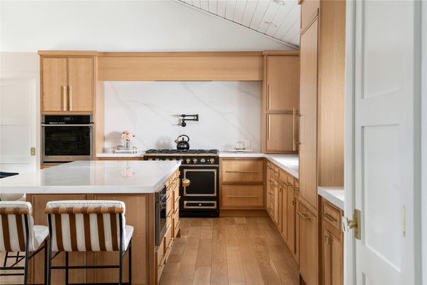 Interior, Kitchen, Marble Walls, Stainless Steel Appliances, Wood Texture Flooring
