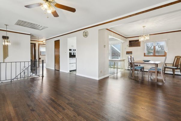 Chandelier, Dining room, Interior, Kitchen, Pendant Lights, Stainless Steel Appliances, Wood Texture Flooring