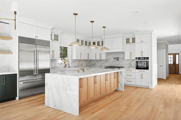 Interior, Kitchen, Marble Walls, Pendant Lights, Recessed Lighting, Stainless Steel Appliances, Wood Texture Flooring
