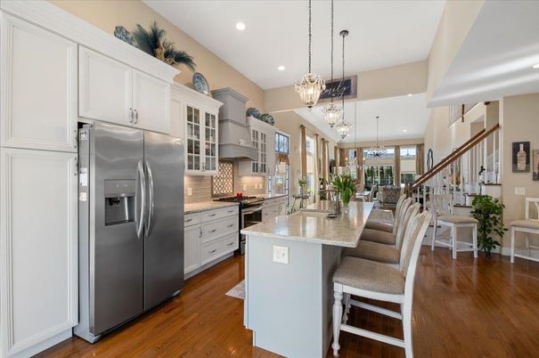 Chandelier, Interior, Kitchen, Pendant Lights, Recessed Lighting, Stainless Steel Appliances, Wood Texture Flooring