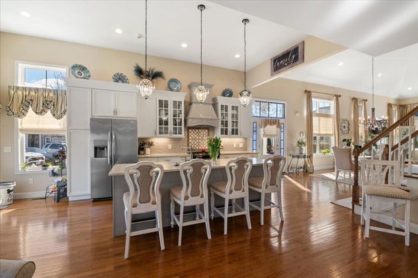 Chandelier, Dining room, Interior, Kitchen, Pendant Lights, Recessed Lighting, Stainless Steel Appliances, Wood Texture Flooring