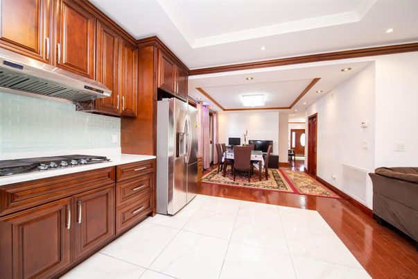 Chandelier, Dining room, Interior, Kitchen, Recessed Lighting, Stainless Steel Appliances, Wood Texture Flooring