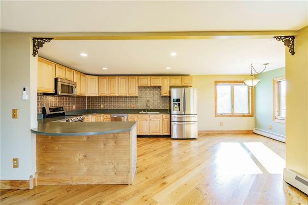Interior, Kitchen, Pendant Lights, Recessed Lighting, Stainless Steel Appliances, Wood Texture Flooring