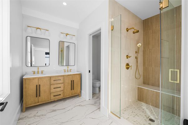 Bathroom, Dual Sink Vanities, Glass Shower, Interior, Marble, Recessed Lighting