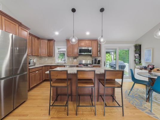 Dining room, Interior, Kitchen, Pendant Lights, Recessed Lighting, Stainless Steel Appliances, Wood Texture Flooring