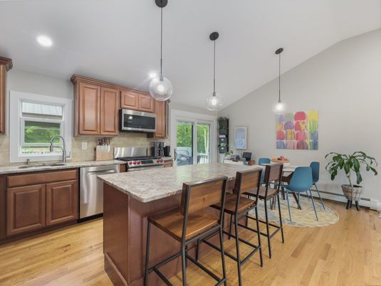 Dining room, Interior, Kitchen, Pendant Lights, Recessed Lighting, Stainless Steel Appliances, Wood Texture Flooring