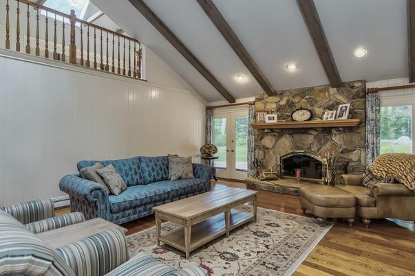 Fireplace, Interior, Living room, Recessed Lighting, Stone Walls, Wooden Beams, Wood Texture Flooring